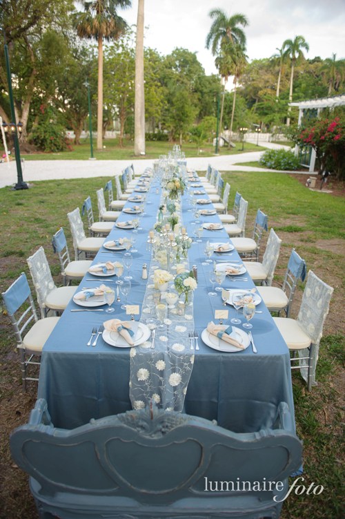 vintage wedding reception family long table seating blue mason jars edison ford